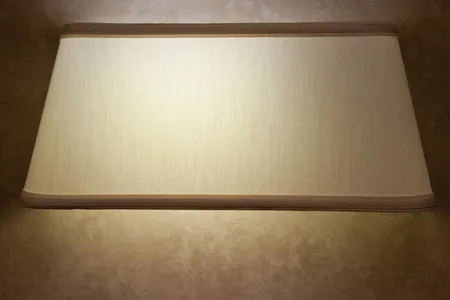 Sconce with double-fold trim