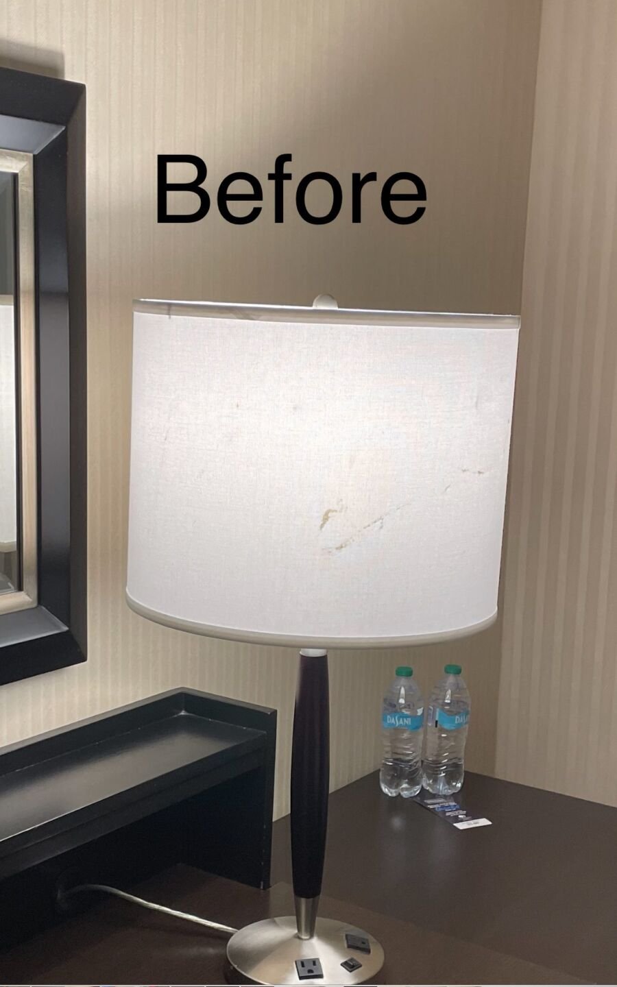 Hotel bedside lamp with an old drum lampshade